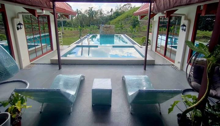 King's Manor — pool & garden: pool veranda loungers