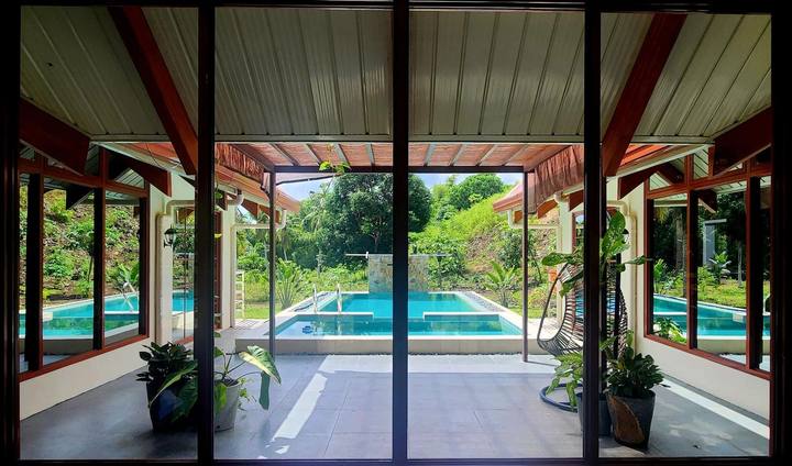 King's Manor — pool & garden: pool veranda view